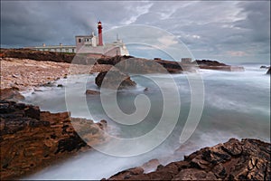 Cape Raso Lighthouse in Cascais, Portugal photo