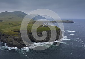 Cape with Shpanberg Lighthouse on Shikotan Island. Lesser Kuril Chain, Russia