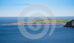 Cape Spear seen from Signal Hill. Calm Atlantic Ocean