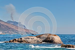 Cape Town coastline with a fire in the far background