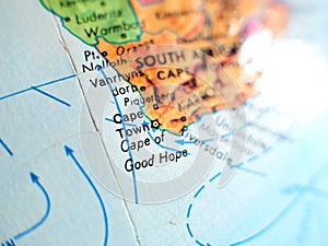 Cape Town South Africa focus macro shot on globe map for travel blogs, social media, website banners and backgrounds.