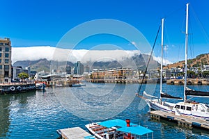 Cape Town, South Africa - January 29, 2020: Table Mountain at the Victoria & Alfred Waterfront. Copy space for text