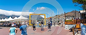 Cape Town, South Africa - January 29, 2020: Yellow frame for making photos of Table Mountain at Cape Town waterfront. Copy space