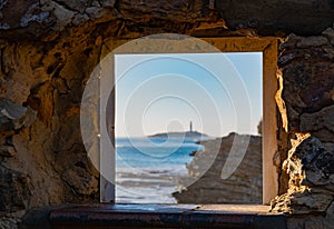 Cape of trafalgar seen from a window in CaÃ±os de Meca photo