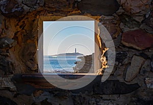 Cape of trafalgar seen from a window in Caños de Meca