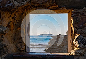 Cape of trafalgar seen from a window in Caños de Meca