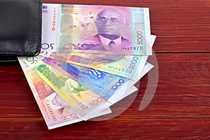 Cape Verdean Escudo in the black wallet photo