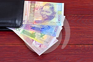 Cape Verdean money in the black wallet photo