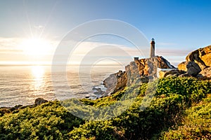 Cape Vilan Lighthouse, Cabo Vilano, in Galicia at sunset, Spain