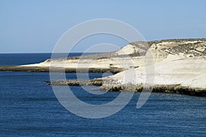 Cape with white cliffs in the ocean