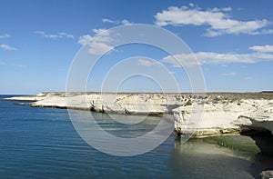 Cape with white cliffs in the ocean