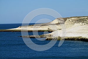 Cape with white cliffs in the ocean