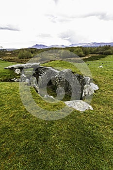 Capel Garmon Burial Chamber with Welsh Mountains in Distance