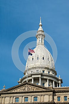 Capital Building with American flag for the State of Michigan