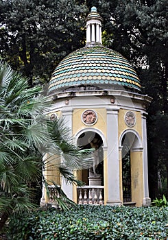 Capital with female statue located in the park, near the entrance to Villa Montughi or Stibbert.