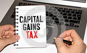 Capital gains tax-text label in the form of a document Registrar planning folder.