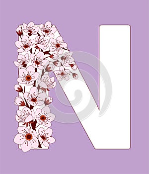 Capital letter N patterned with cherry blossom twig