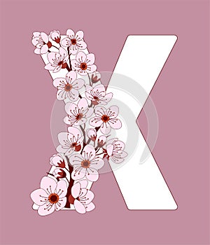 Capital letter X patterned with cherry blossom twig