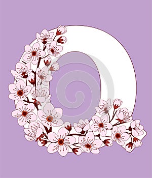 Capital letter Q patterned with cherry blossom twig