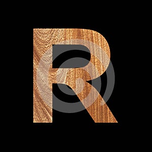 Capital letter R on oak wood texture - Black background