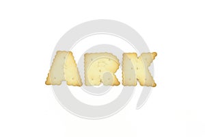 Capital letter shaped biscuits forming word ARK isolated on white background