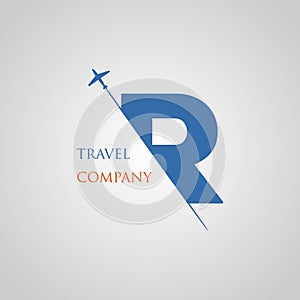 Capital R letter is inserted in the paper slot with the plane slice letter R for travel logo
