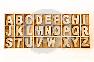 Capital wooden block letter ABC alphabet set in a wood box