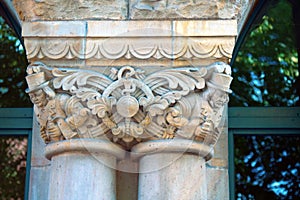 Capitals of columns and pilasters of buildings of eclectic architecture photo