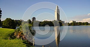 Capitol lake calm reflecting the Louisiana State Capital Building in Baton Rouge