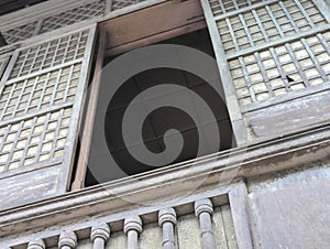 The capiz window shutters of an old Spanish Colonial House