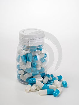 Caplets medicine bottle isolated on white
