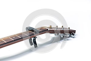 Capo on acoustic guitar