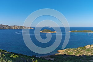 Capo Coda Cavallo bay at sunset, Sardinia Italy.