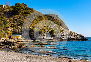 Capo Mazzaro cape aside Isola Bella island at Taormina bay on Ionian sea shore in Messina region of Sicily in Italy