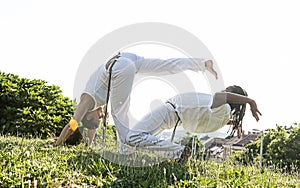 Capoeira couple of awesome stunt outdoors