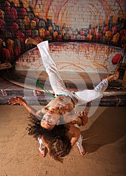 Capoeira Performers Doing Throws