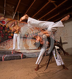 Capoeira Performers Shoulder Throw