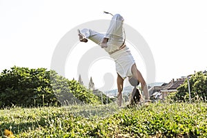 Capoeira woman, awesome stunts in the outdoors