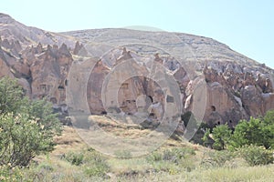 Cappadocia cave houses in tuff formations in Turkey.