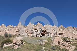 Cappadocia cave houses in tuff formations in Turkey.