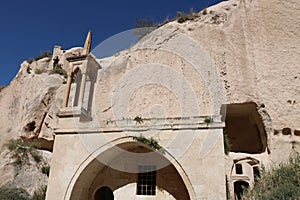 Cappadocia cave houses in tuff formations in Turkey.