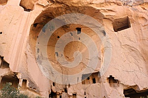 Cappadocia cave houses in tuff formations in Turkey.