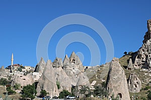 Cappadocia cave houses in tuff formations in Turkey.