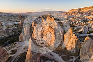 Cappadocia Fairy Chimney and Red Valley pinnacle rocks sunset dusk
