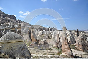 Cappadocia fairy chimneys in the canyon near Cavusin village, ne