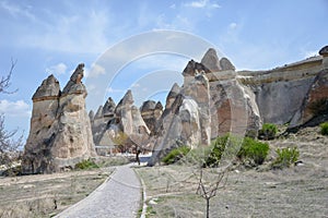 Cappadocia fairy chimneys in the canyon near Cavusin village, ne