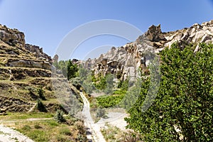 Cappadocia, Turkey. : Scenic view of a mountain valley with caves into the rocks in the National Park of Goreme