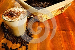Cappuccino with coffee beans photo