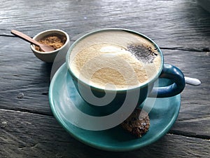 Cappuccino . Coffee and brown sugar. Blue