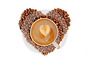 Cappuccino Coffee on Heap of Heart Shaped Roasted Coffee Beans